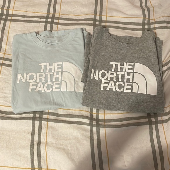 The North Face Tops - two light blue and grey north face shirts